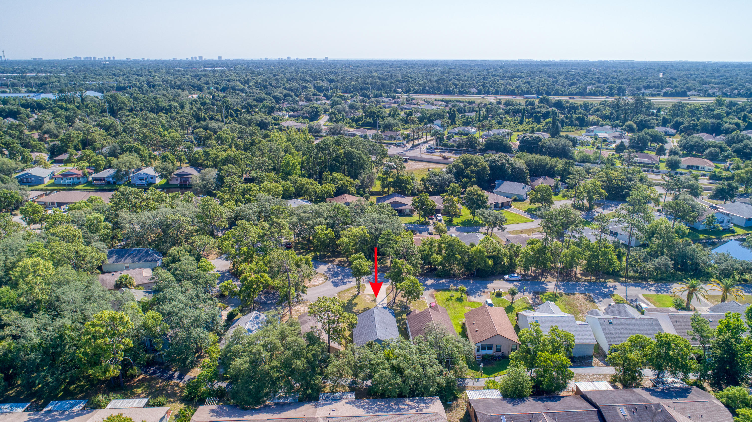 89 Crooked Pine Road Port Orange, FL 32128 - Photo 5 of 45 89CrookedPineRoad_Drone-7_arrow