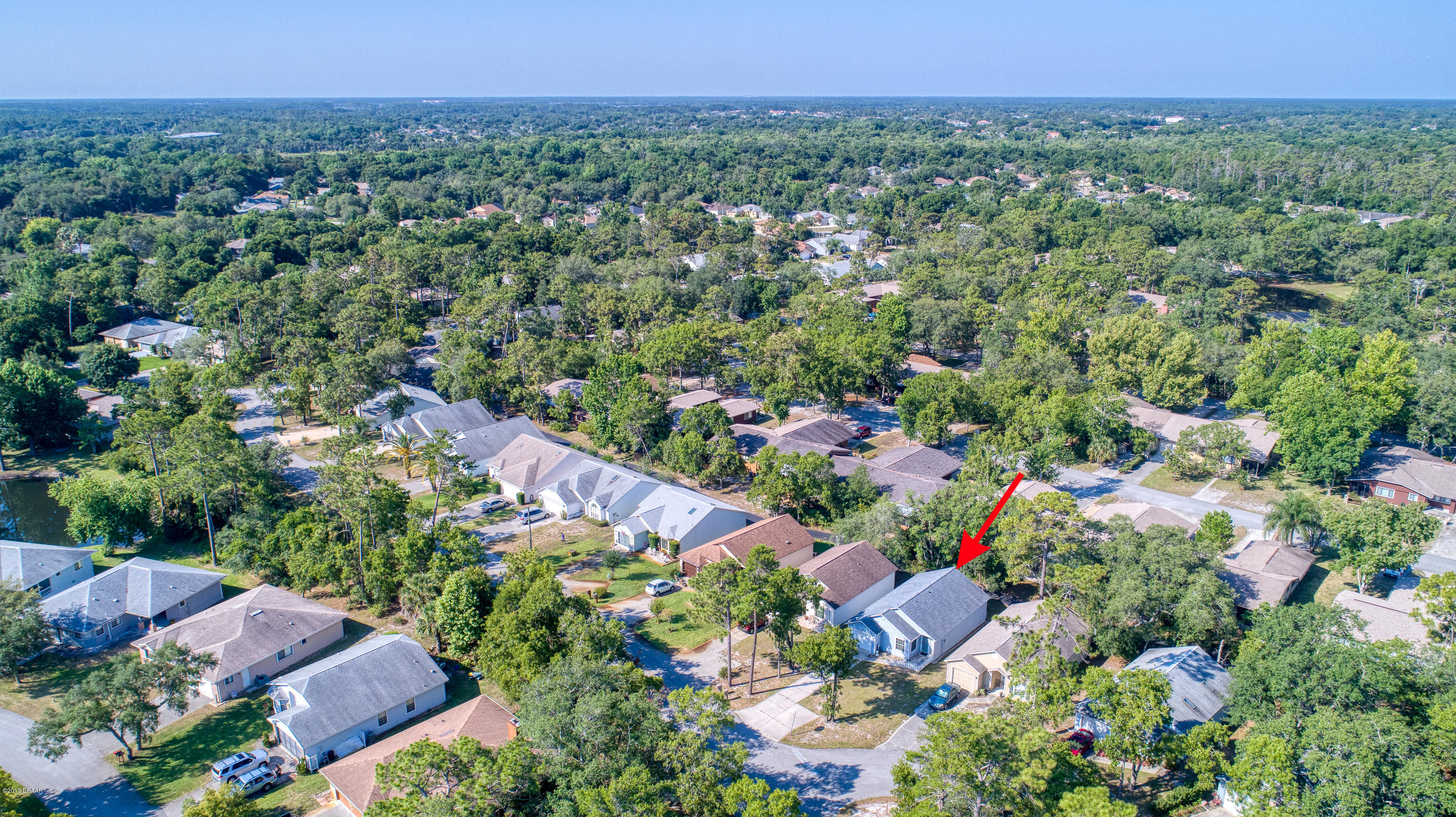 89 Crooked Pine Road Port Orange, FL 32128 - Photo 7 of 45 89CrookedPineRoad_Drone-4_arrow