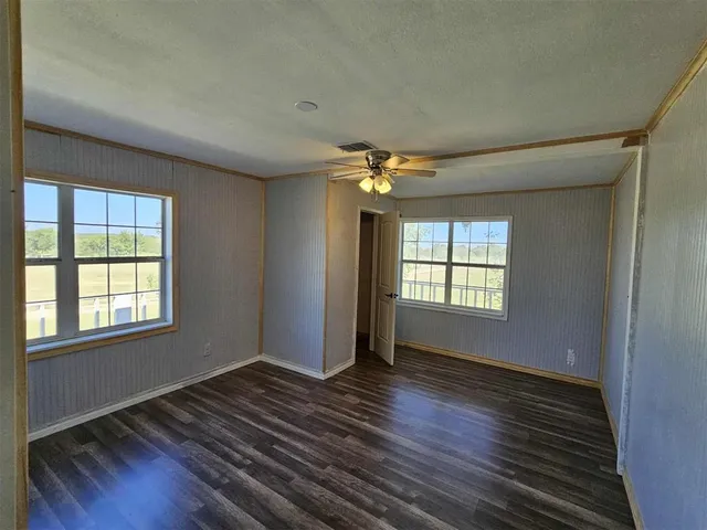 a view of a room with rack on the wall