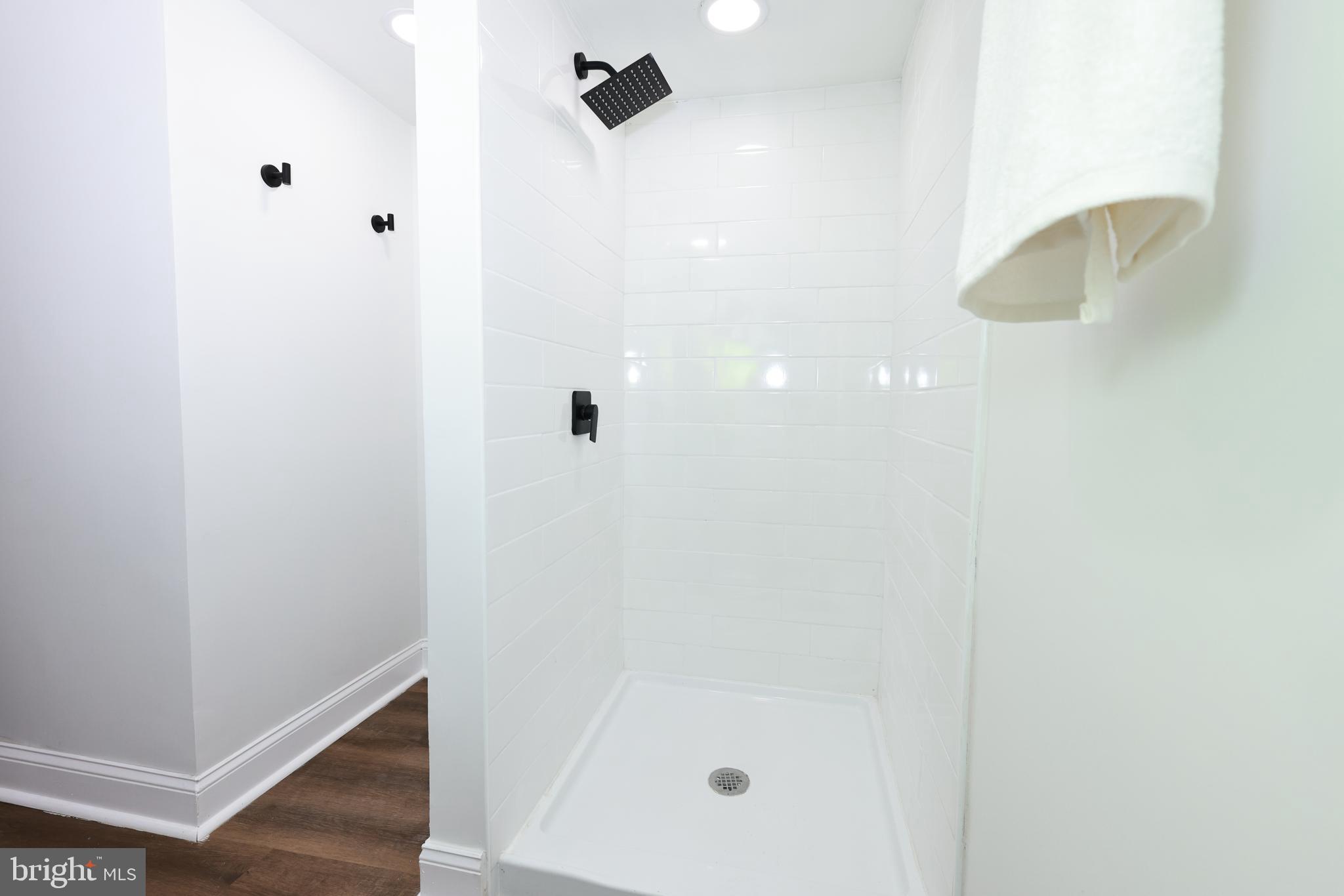4220 Frederick Avenue Baltimore, MD 21229 - Photo 20 of 24 a bathroom with a shower