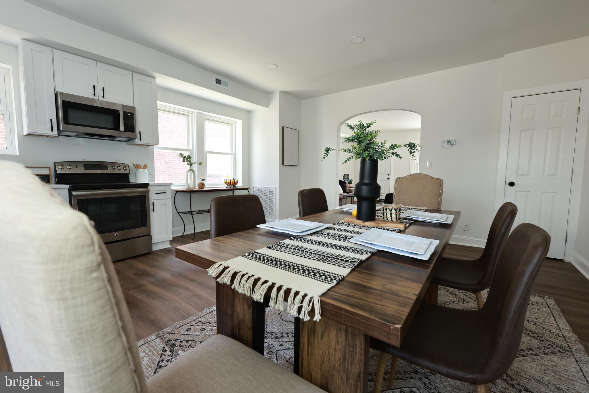 4220 Frederick Avenue Baltimore, MD 21229 - Photo 7 of 24 a view of a dining room with furniture