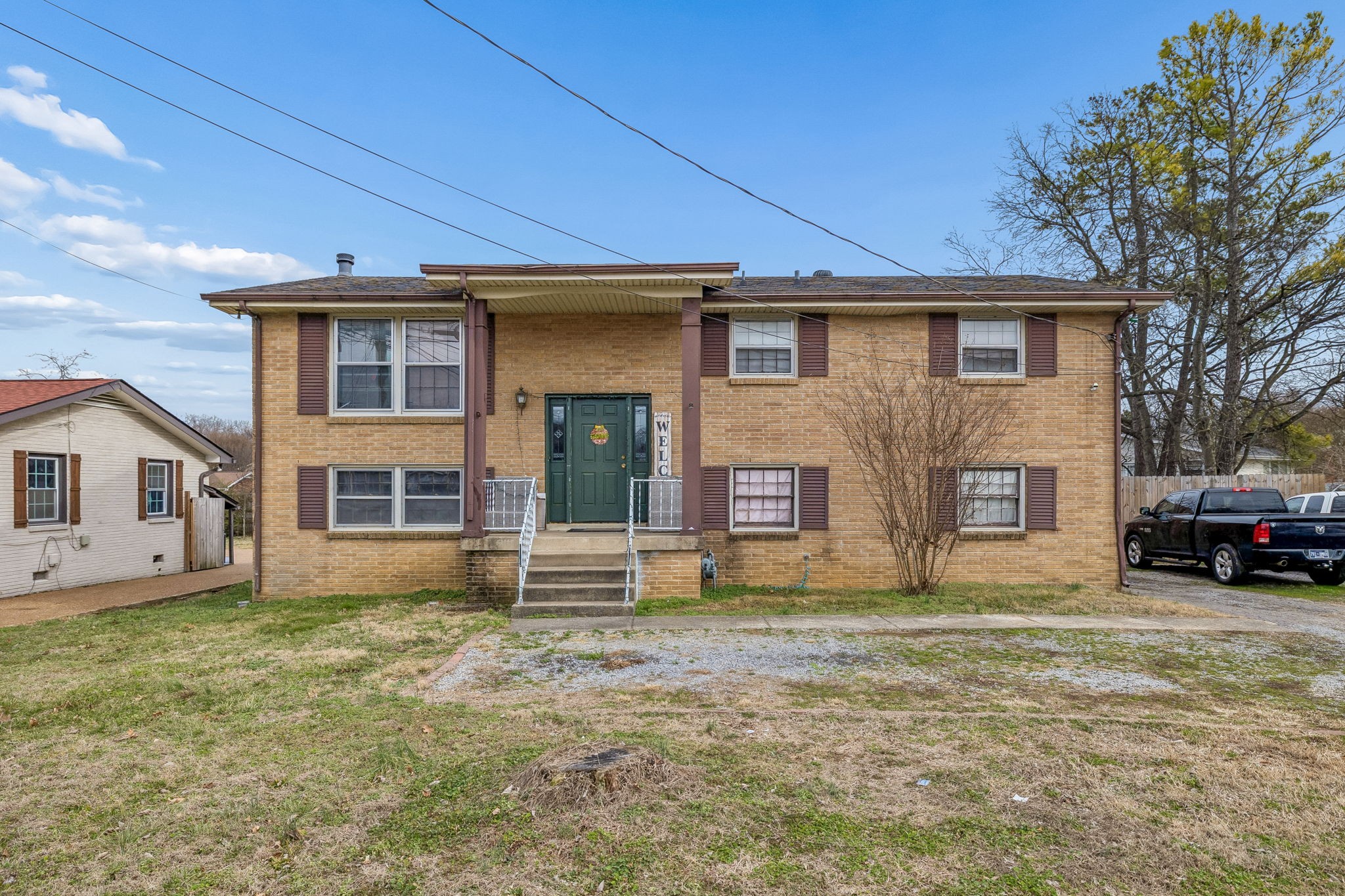 512 Rural Hill Road Nashville, TN 37217 - Photo 1 of 16 a view of a house with a yard and garage