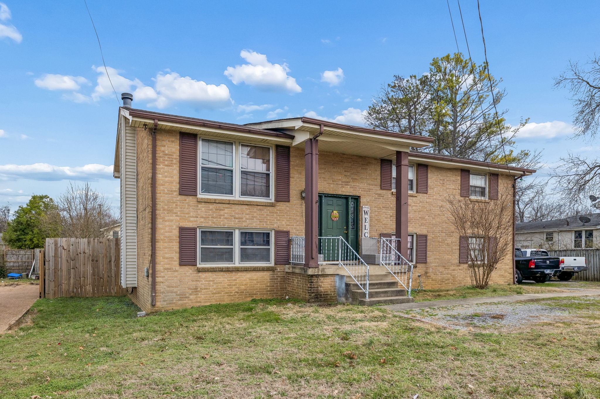 512 Rural Hill Road Nashville, TN 37217 - Photo 2 of 16 a front view of a house with a yard