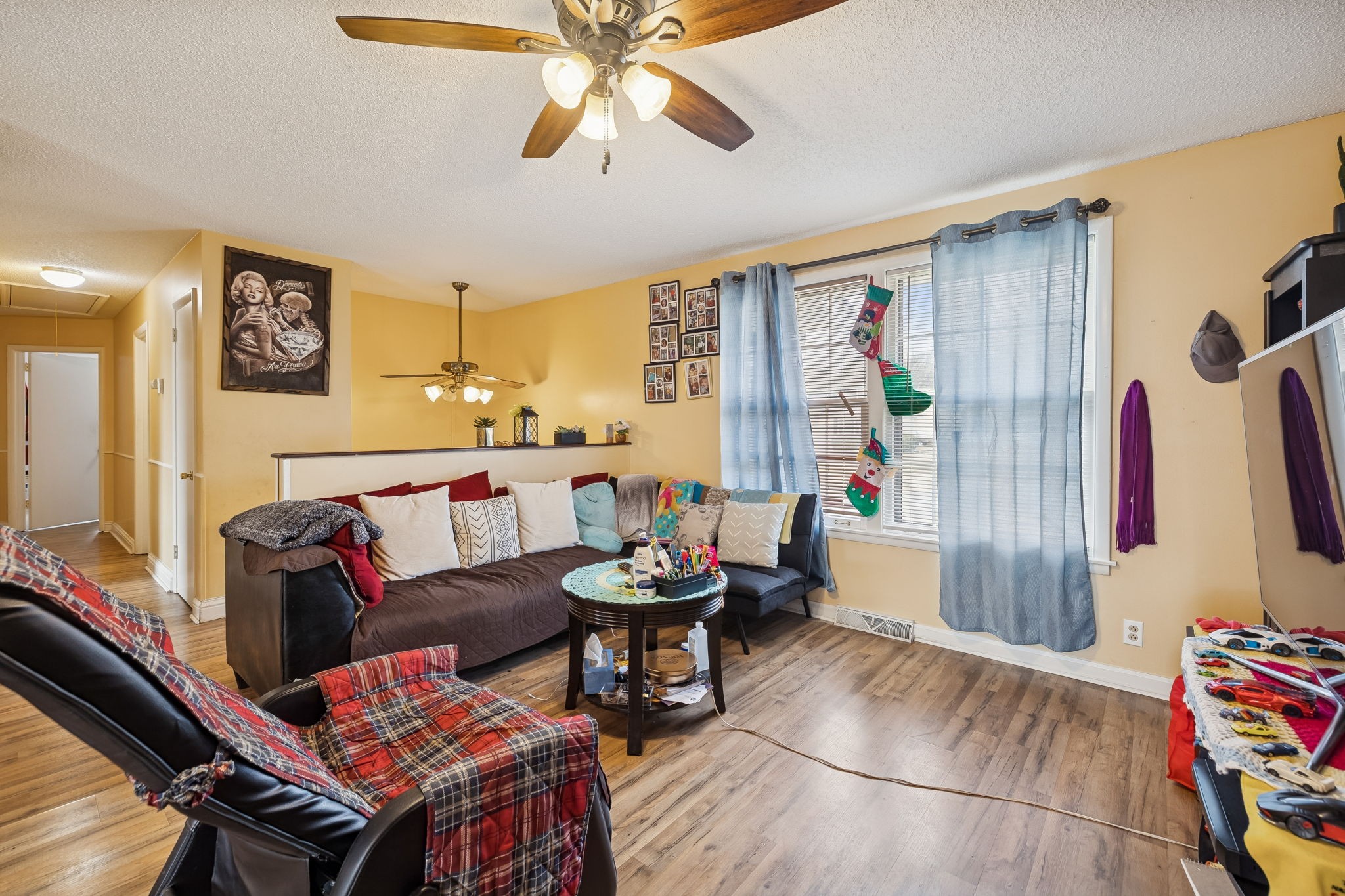 512 Rural Hill Road Nashville, TN 37217 - Photo 3 of 16 a living room with furniture and a flat screen tv