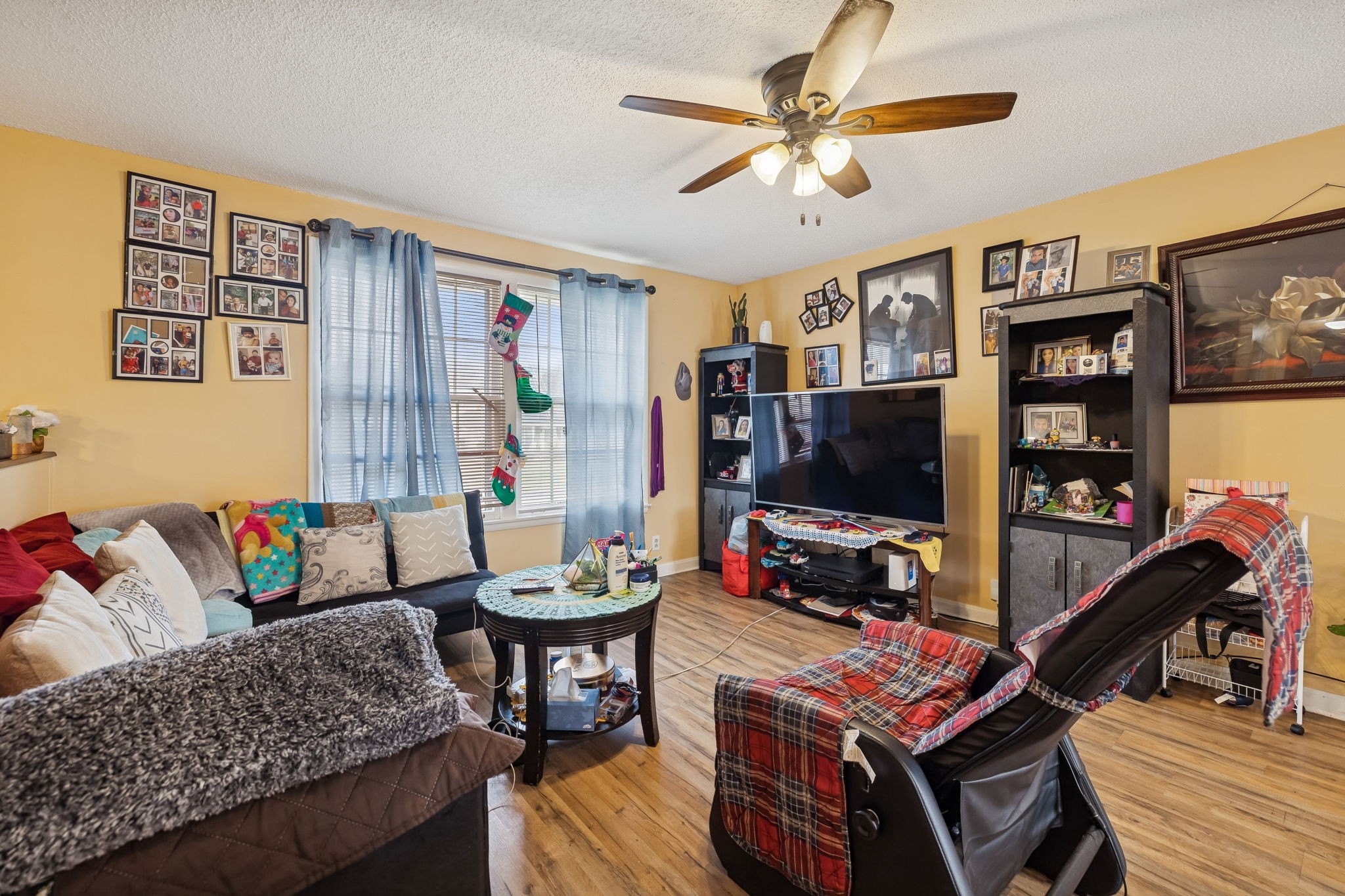 512 Rural Hill Road Nashville, TN 37217 - Photo 4 of 16 a living room with furniture and a flat screen tv