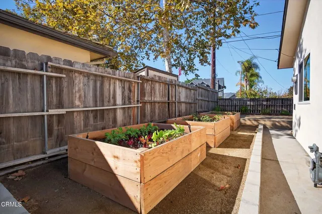 swimming pool view with a seating space