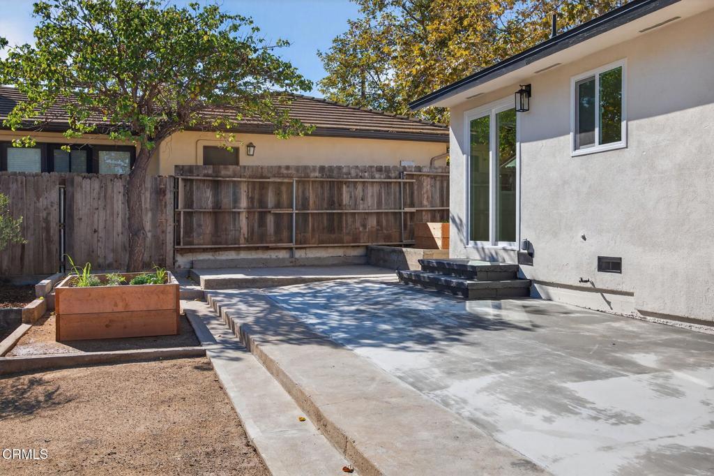 310 Prospect Street Oak View, CA 93022 - Photo 31 of 38 a view of a chair and table in backyard