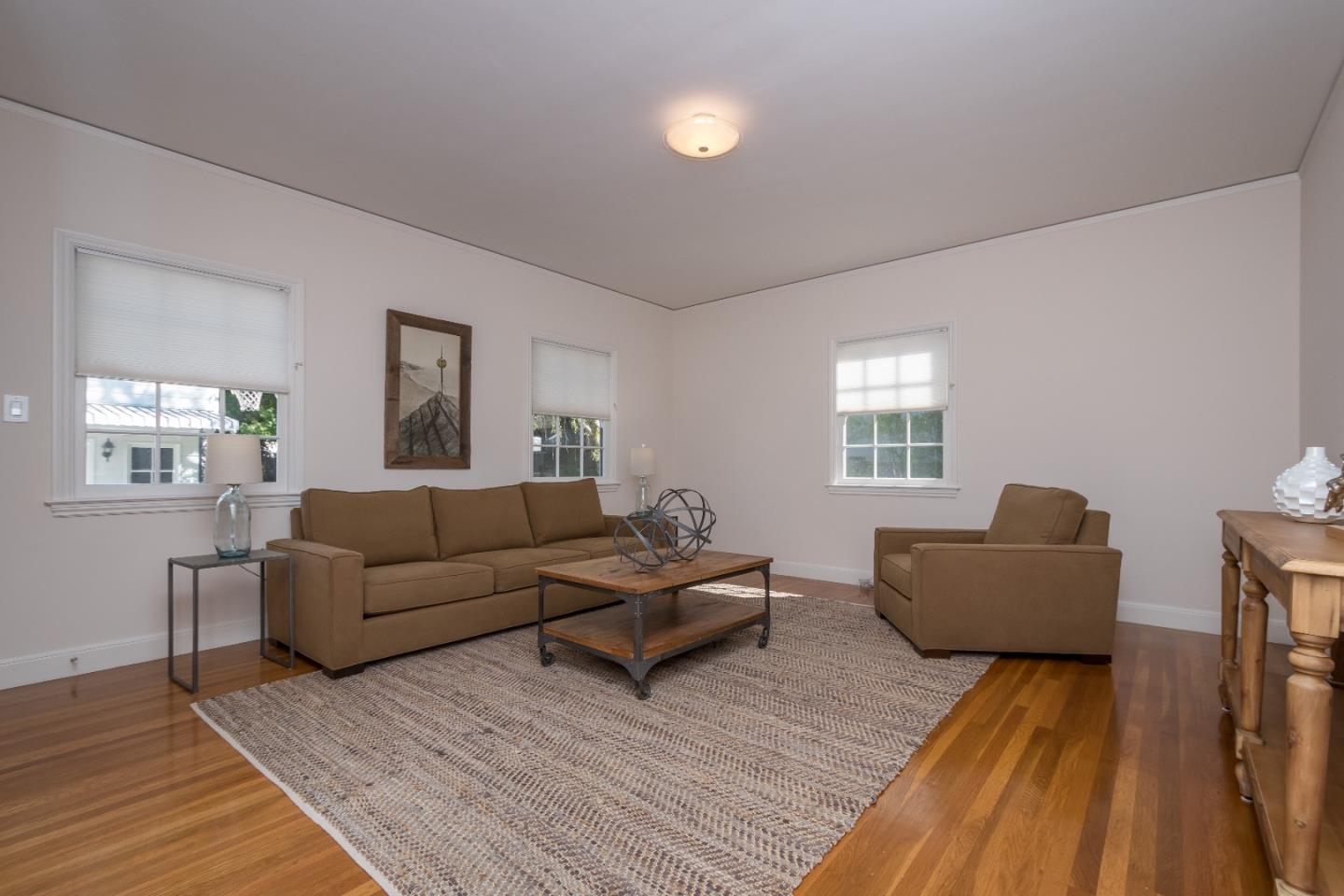 515 Warren Road San Mateo, CA 94402 - Photo 11 of 27 a living room with furniture and a window