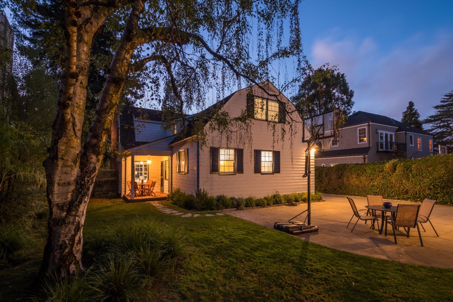 515 Warren Road San Mateo, CA 94402 - Photo 27 of 27 a front view of a house with a yard table and chairs