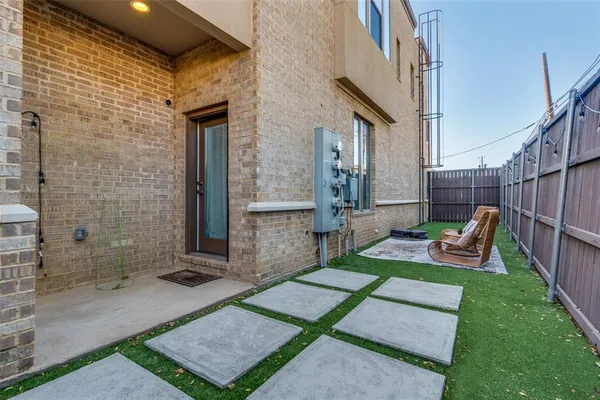 a view of yard with patio