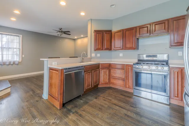 a kitchen with a sink and a window