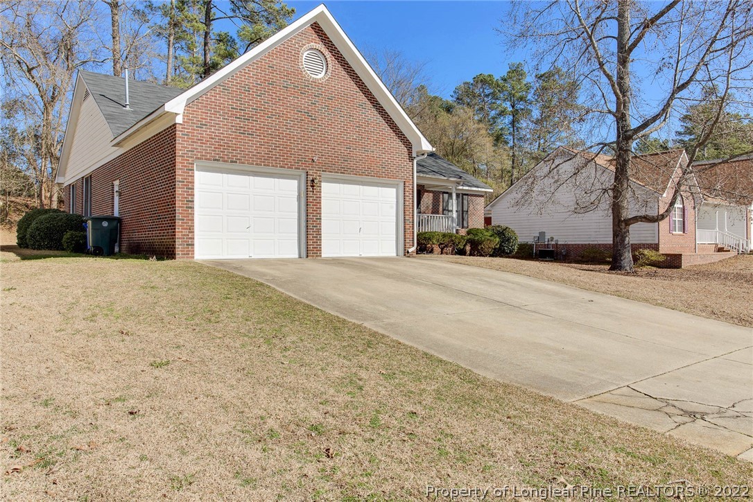 2608 Laurel Lakes Road Fayetteville, NC 28301 - Photo 1 of 32 a view of the house with a yard