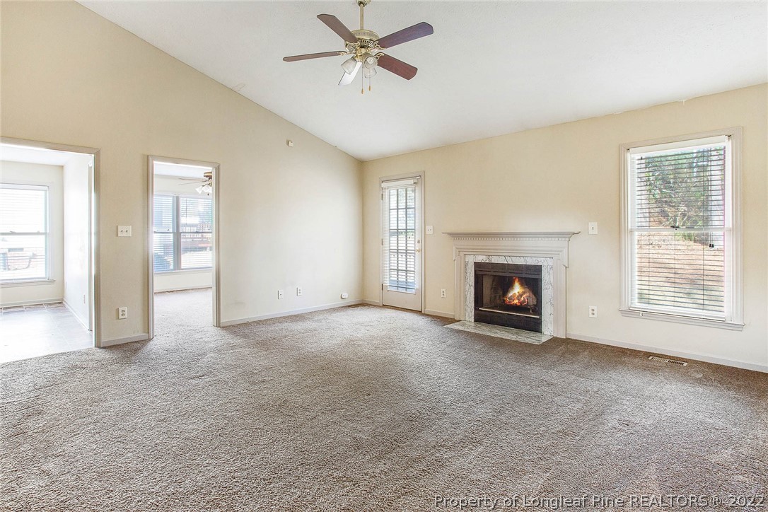 2608 Laurel Lakes Road Fayetteville, NC 28301 - Photo 17 of 32 a view of a livingroom with a fireplace and window