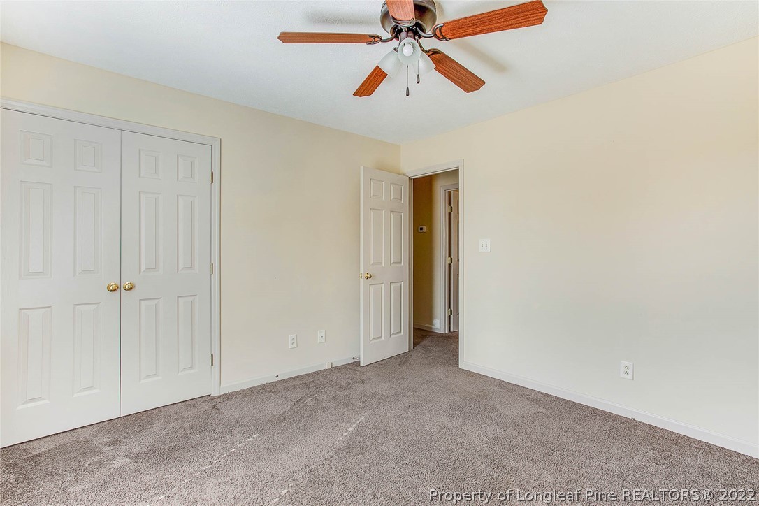 2608 Laurel Lakes Road Fayetteville, NC 28301 - Photo 23 of 32 a view of room with a ceiling fan