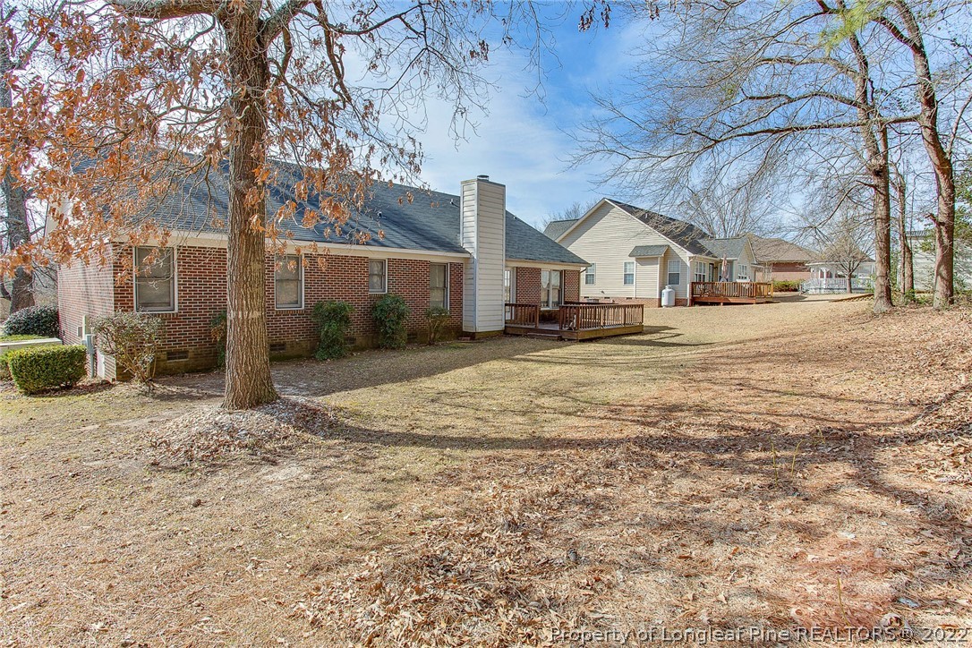 2608 Laurel Lakes Road Fayetteville, NC 28301 - Photo 29 of 32 a front view of a house with a yard and garage