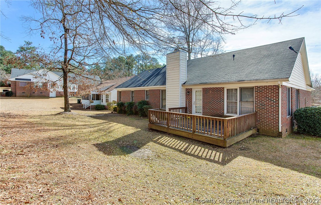 2608 Laurel Lakes Road Fayetteville, NC 28301 - Photo 31 of 32 a view of a house with wooden fence