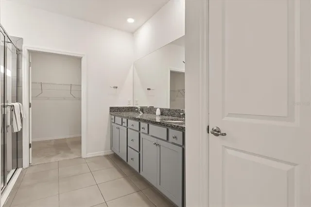 a bathroom with a shower and a toilet
