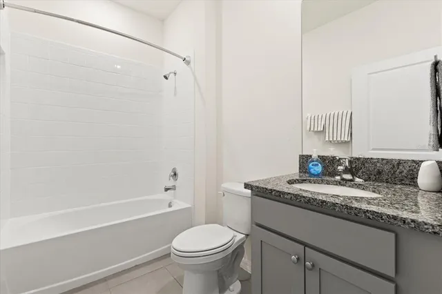 an empty room with closet area