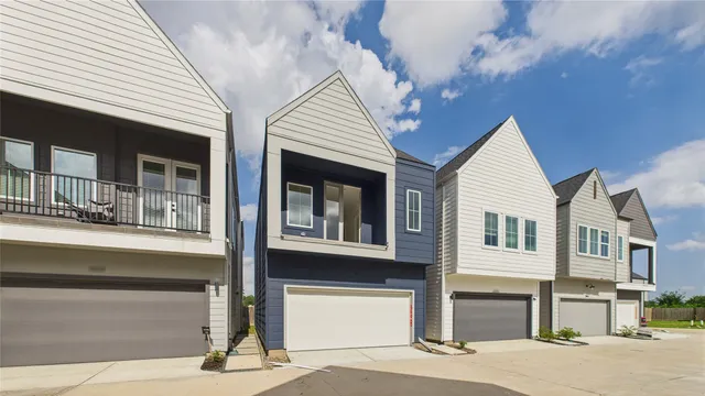 a front view of a house with a garage