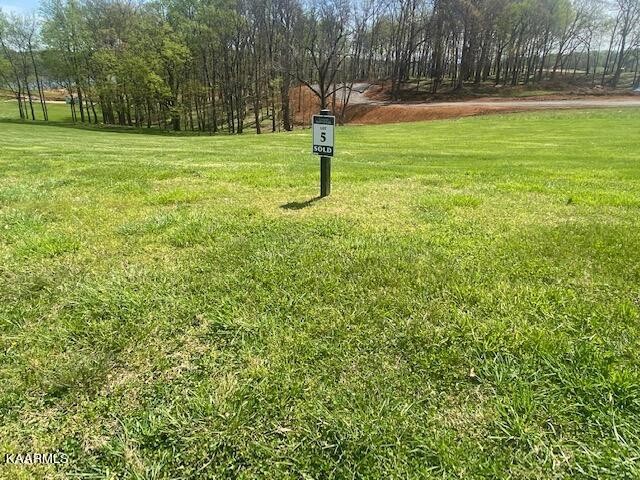 3656 Persimmon Ridge Loudon, TN 37774 - Photo 6 of 17 a view of a playground with basketball court