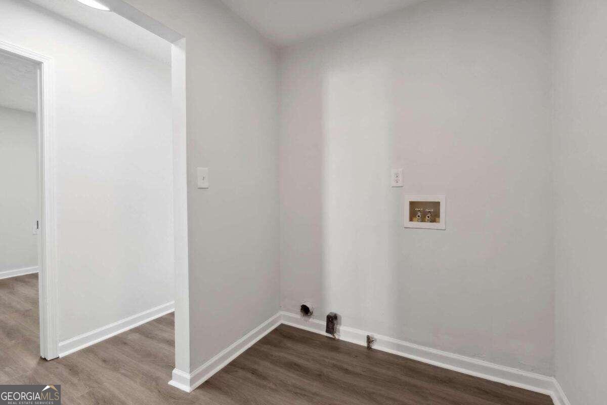 823 Humphries Street Southwest Atlanta, GA 30310 - Photo 17 of 22 a view of a small space with wooden floor