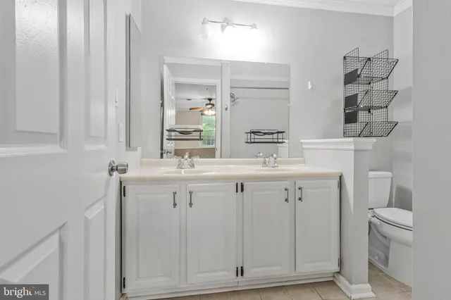a kitchen with a refrigerator and a stove