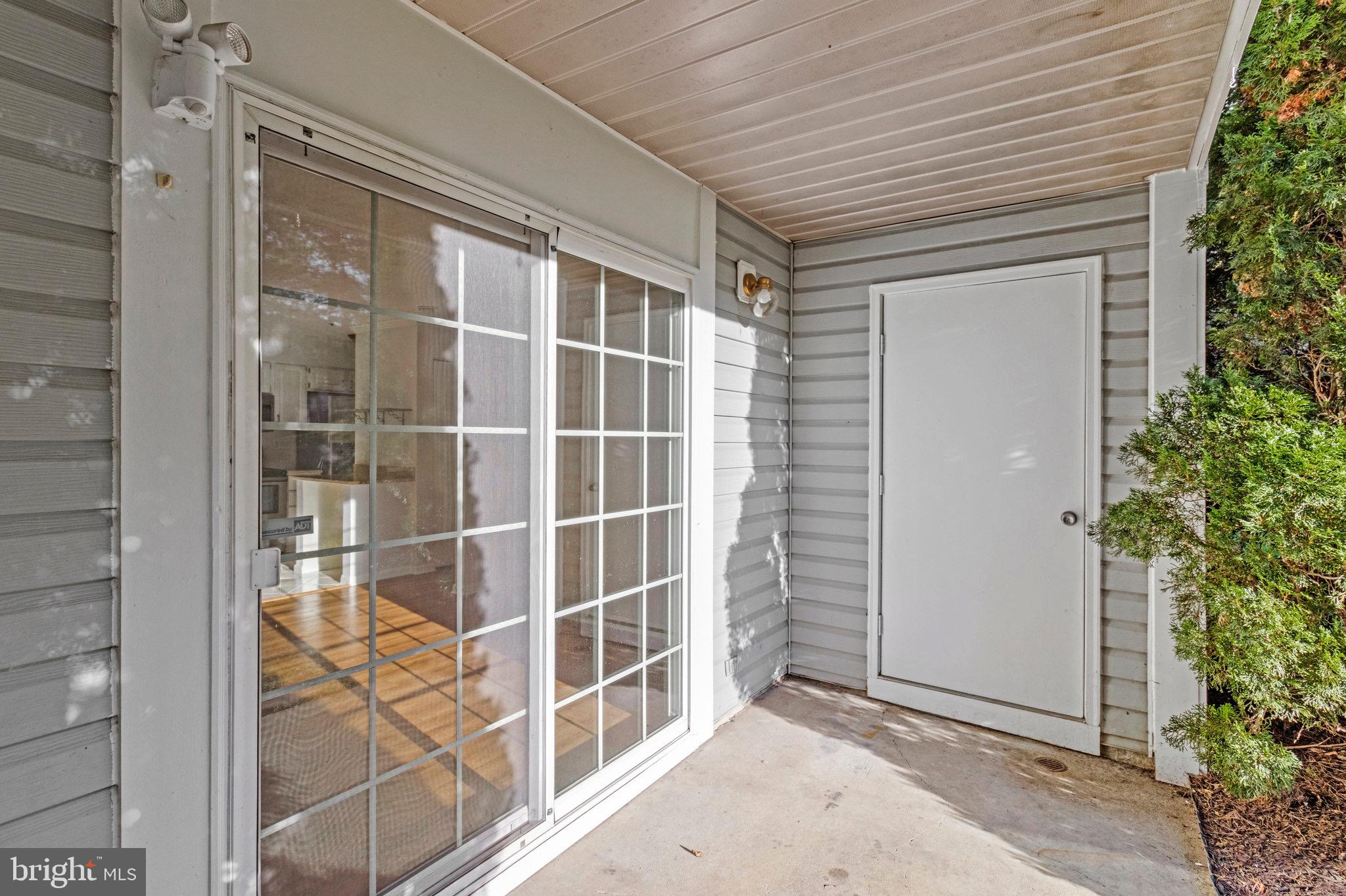 12212 Eagles Nest Court, Unit B Germantown, MD 20874 - Photo 24 of 36 a view of a door and a window
