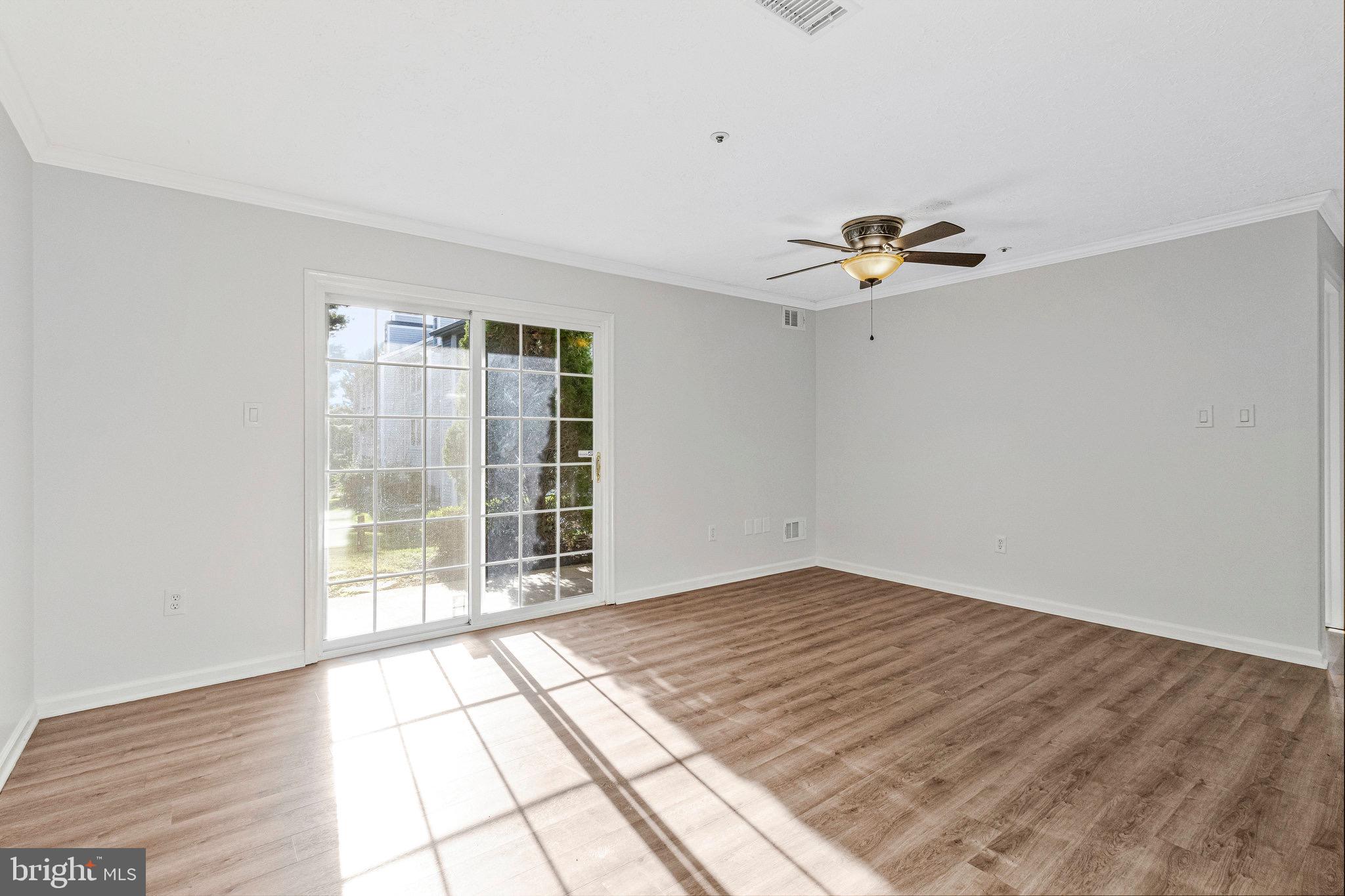 12212 Eagles Nest Court, Unit B Germantown, MD 20874 - Photo 27 of 36 a view of an empty room with a window