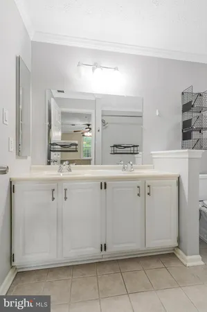 a kitchen with appliances cabinets and a sink