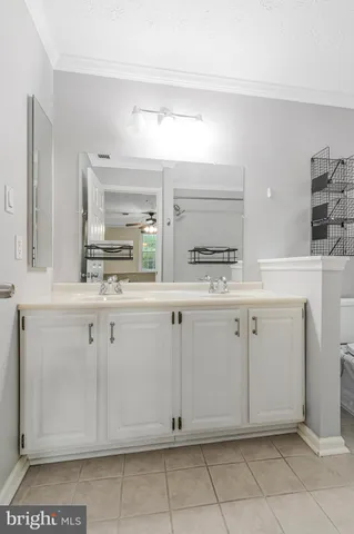 a kitchen with appliances cabinets and a sink
