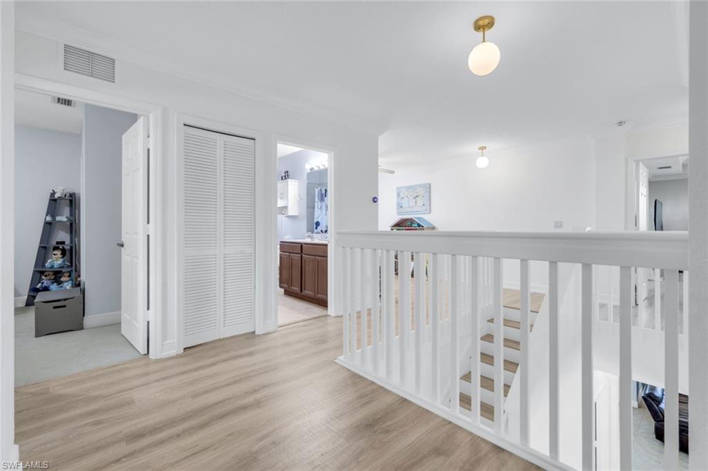 1570 Double Eagle Trail Naples, FL 34120 - Photo 31 of 50 a view of a kitchen with wooden floor
