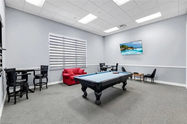 a room with furniture and tables