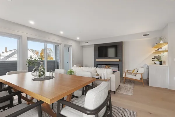 a view of a dining room with furniture window and outside view