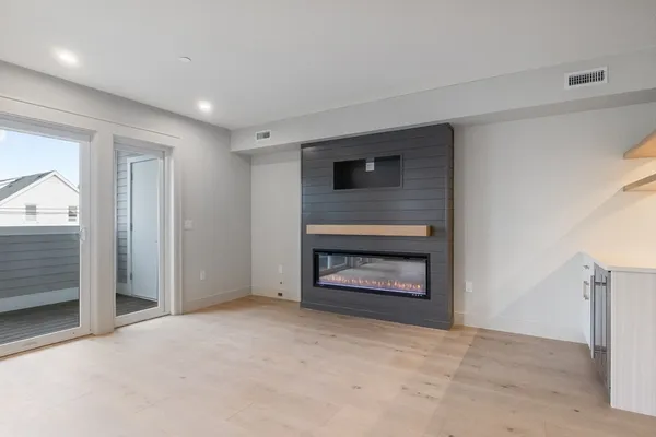 a living room with a fireplace