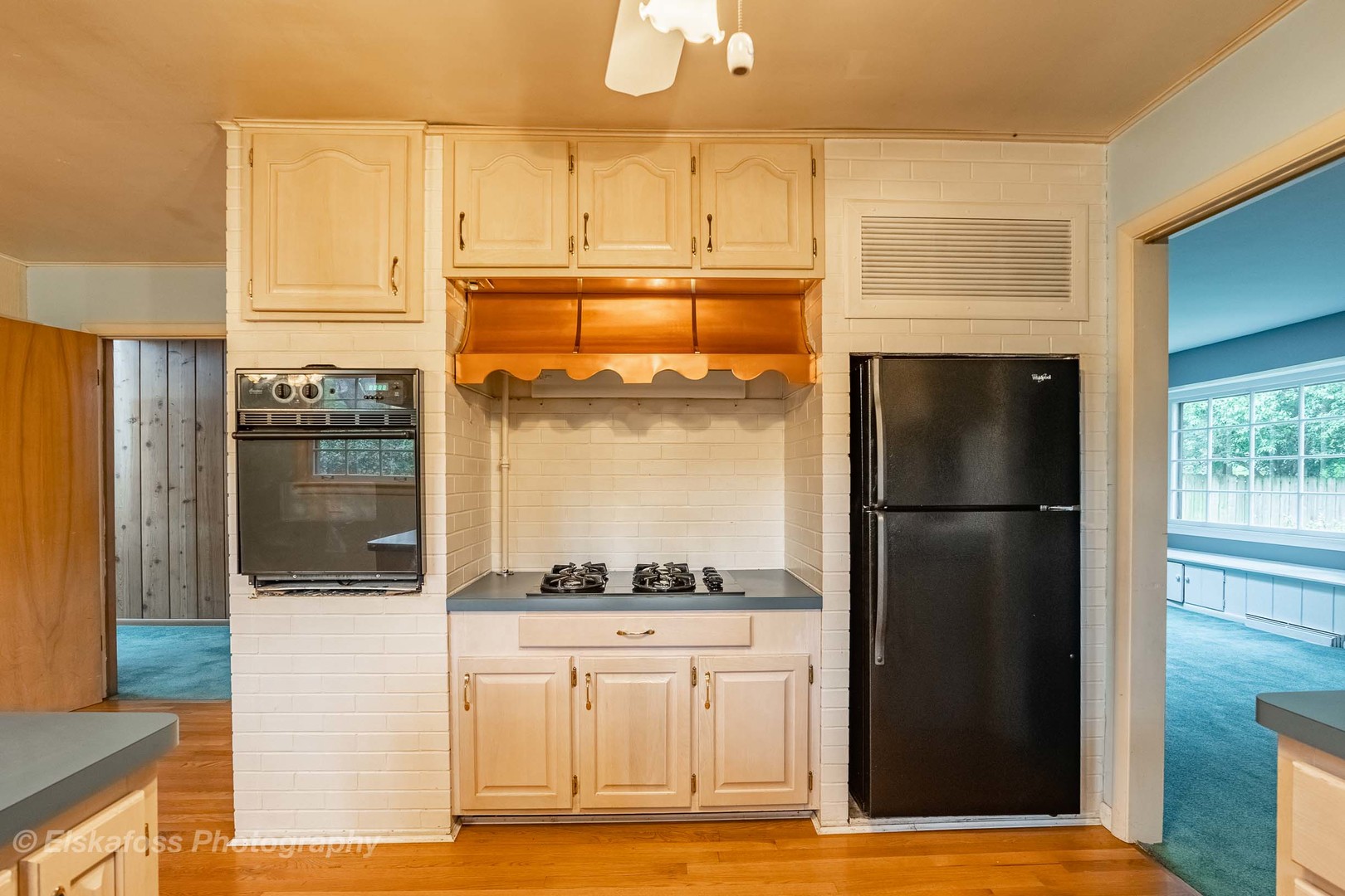 2114 Driving Park Road Wheaton, IL 60187 - Photo 7 of 14 a kitchen with stainless steel appliances a refrigerator and a stove
