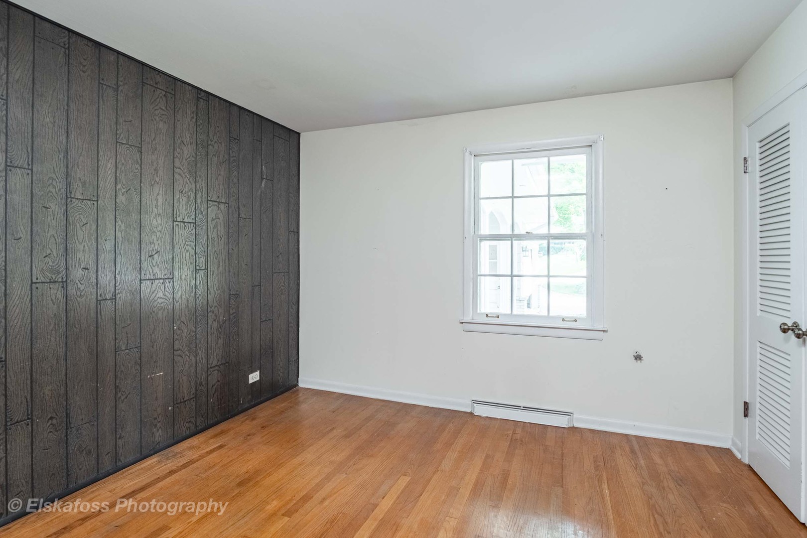 2114 Driving Park Road Wheaton, IL 60187 - Photo 9 of 14 an empty room with wooden floor and windows