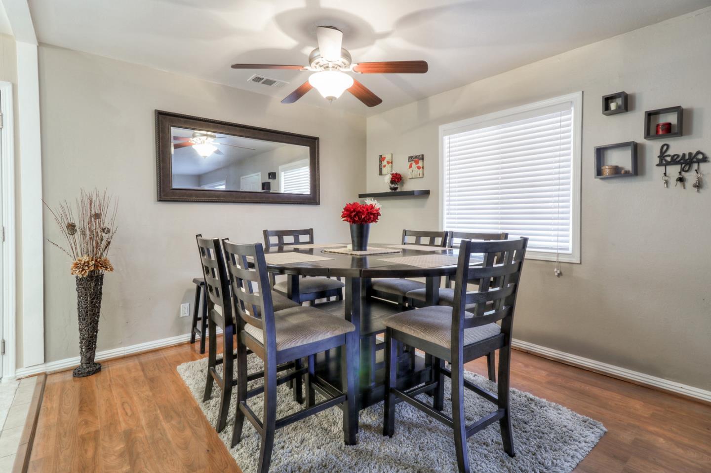 317 Tennyson Road Hayward, CA 94544 - Photo 12 of 21 a view of a dining room with furniture and wooden floor