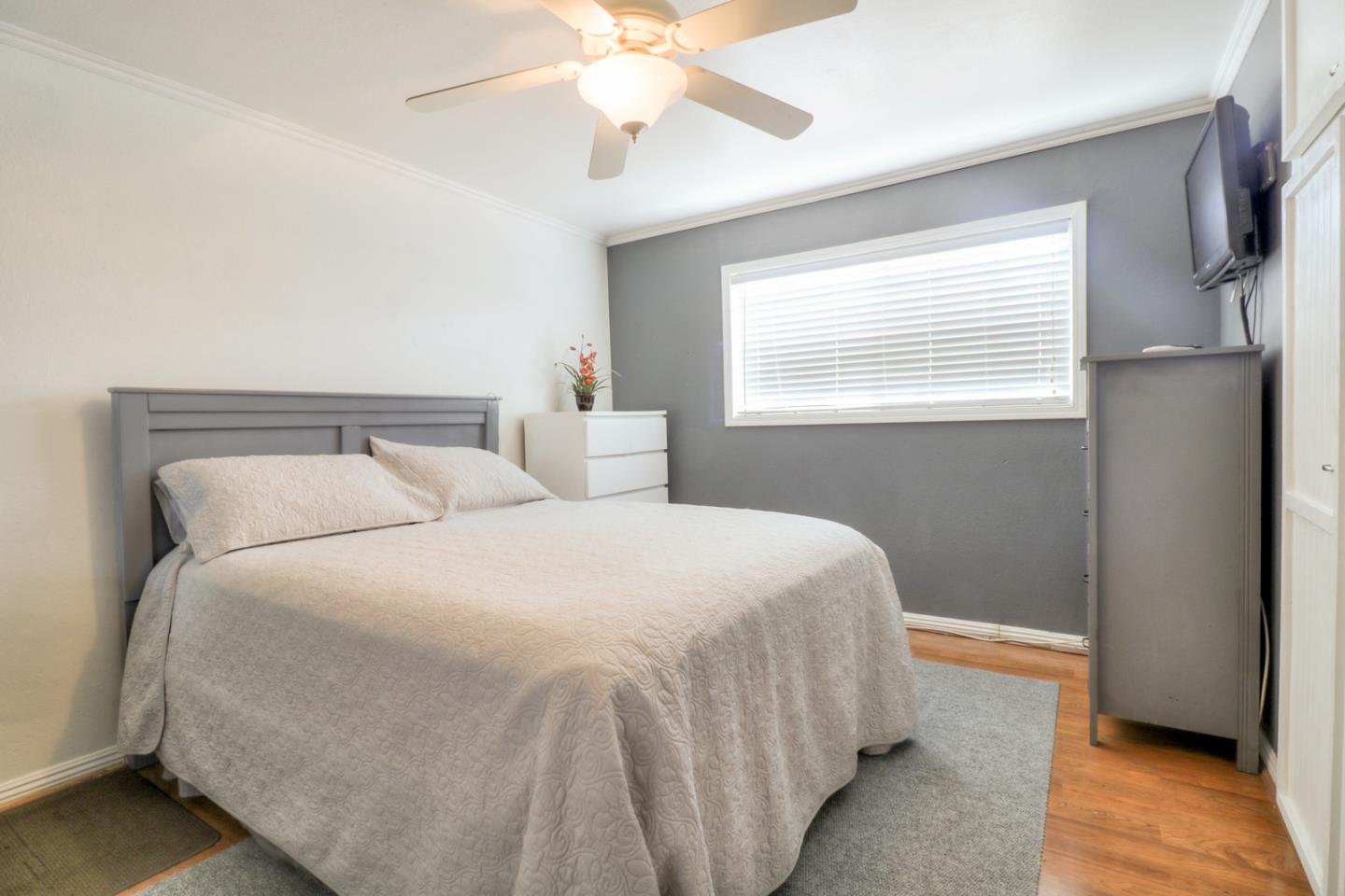 317 Tennyson Road Hayward, CA 94544 - Photo 13 of 21 a bedroom with a bed and a window