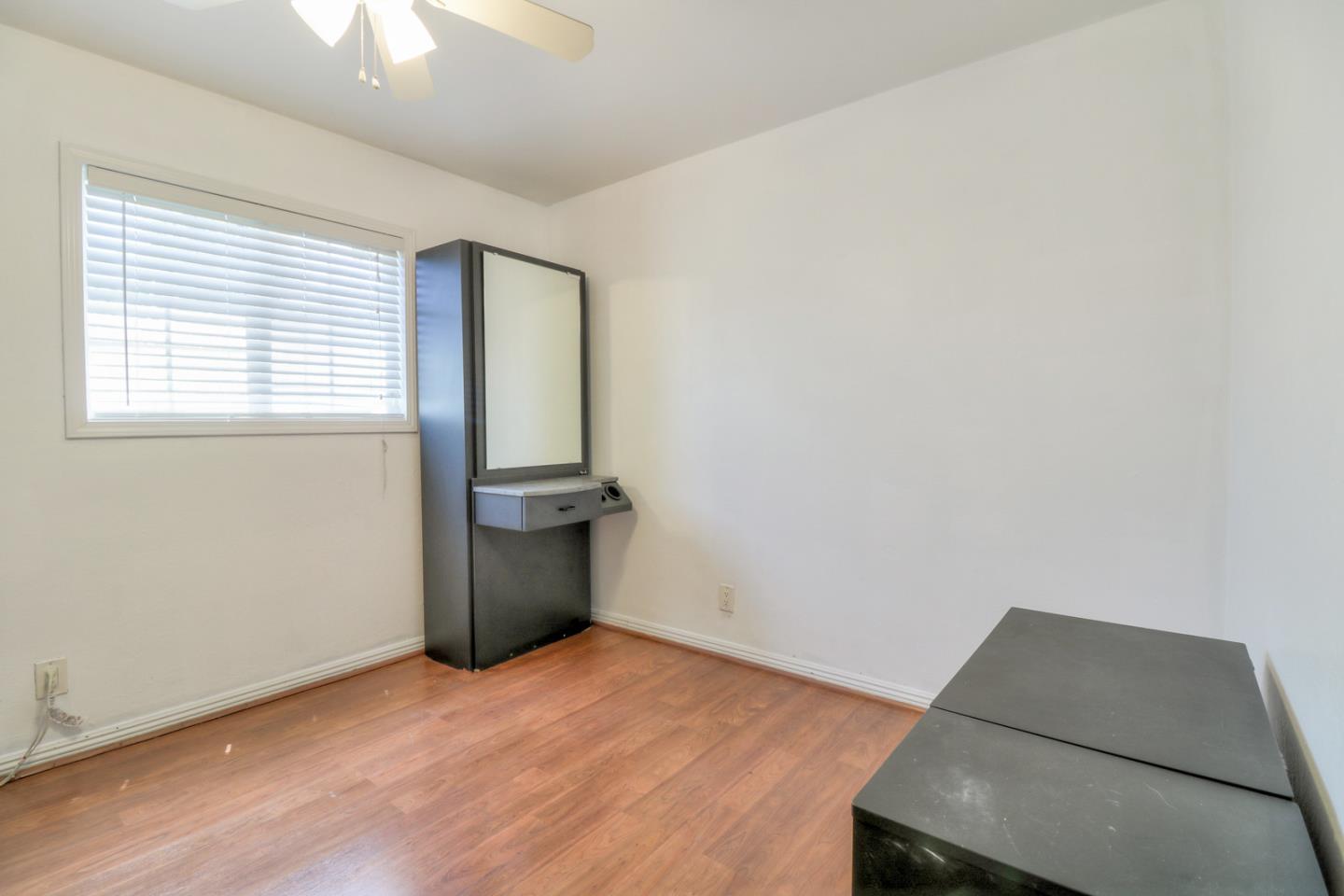 317 Tennyson Road Hayward, CA 94544 - Photo 15 of 21 an empty room with a window