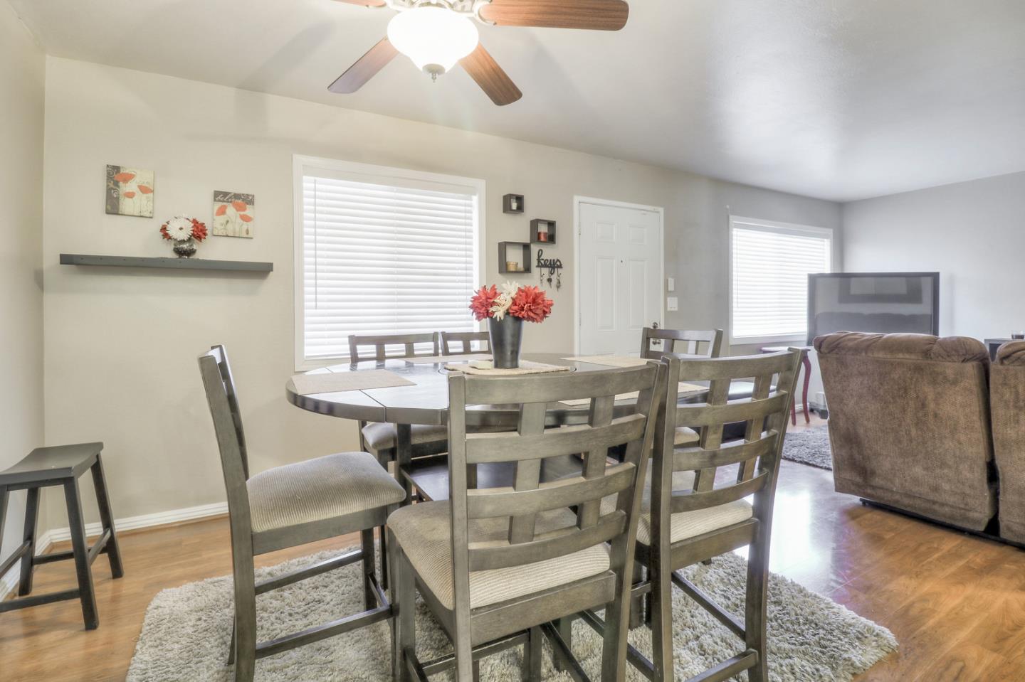 317 Tennyson Road Hayward, CA 94544 - Photo 10 of 21 a view of a dining room with furniture and wooden floor