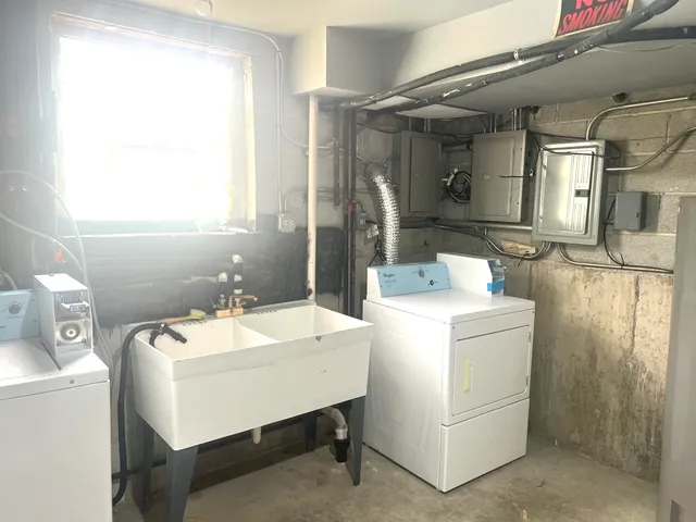a utility room with dryer and washer