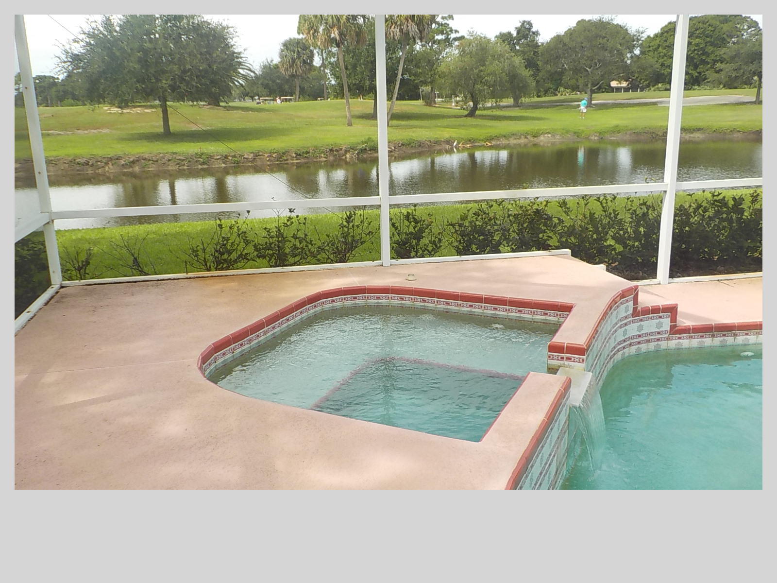 2159 Southeast Erwin Road Port St. Lucie, FL 34952 - Photo 34 of 48 a view of a swimming pool with a yard