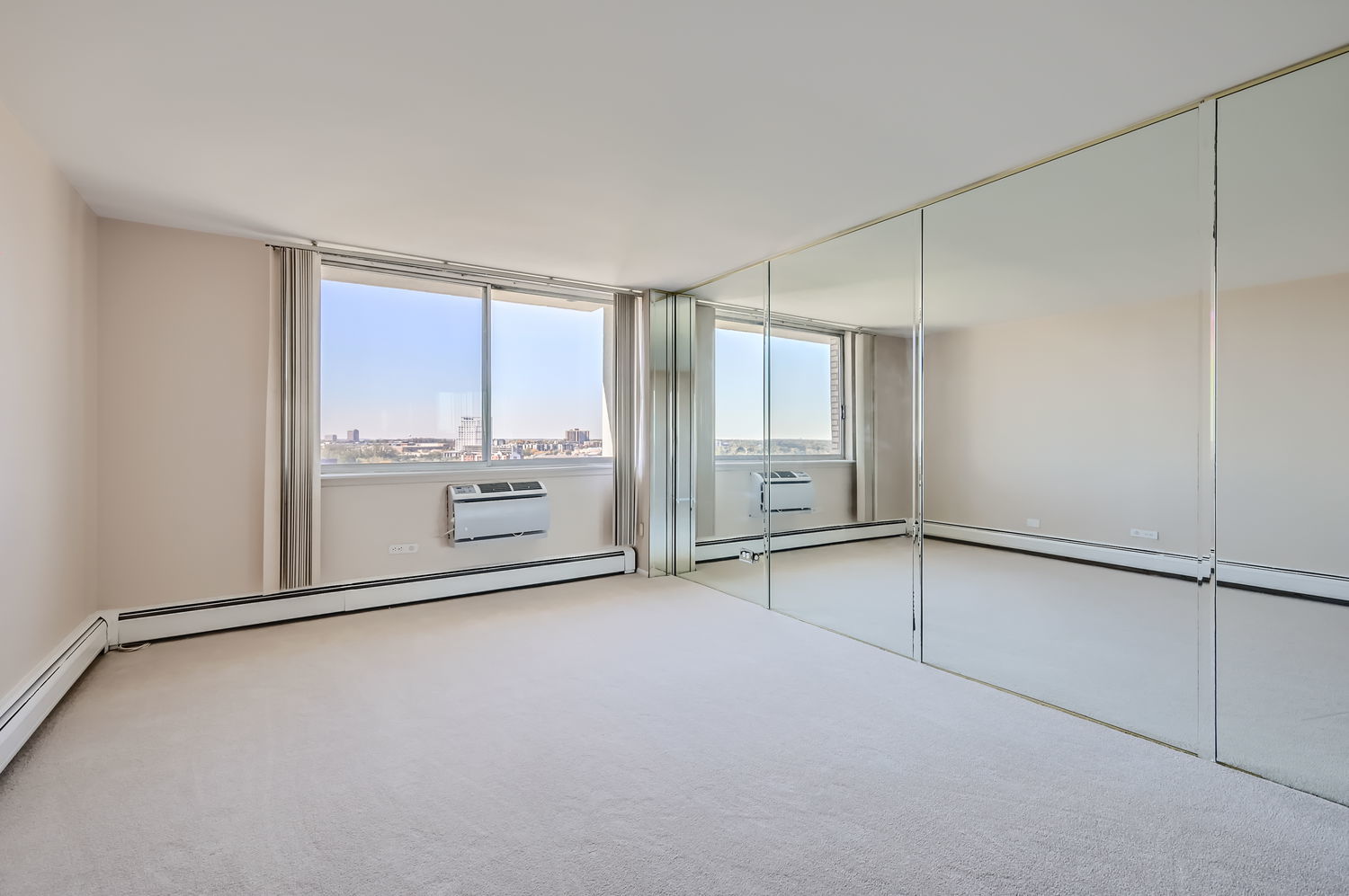 20 North Tower Road, Unit 12M Oak Brook, IL 60523 - Photo 15 of 28 a view of an empty room with a window
