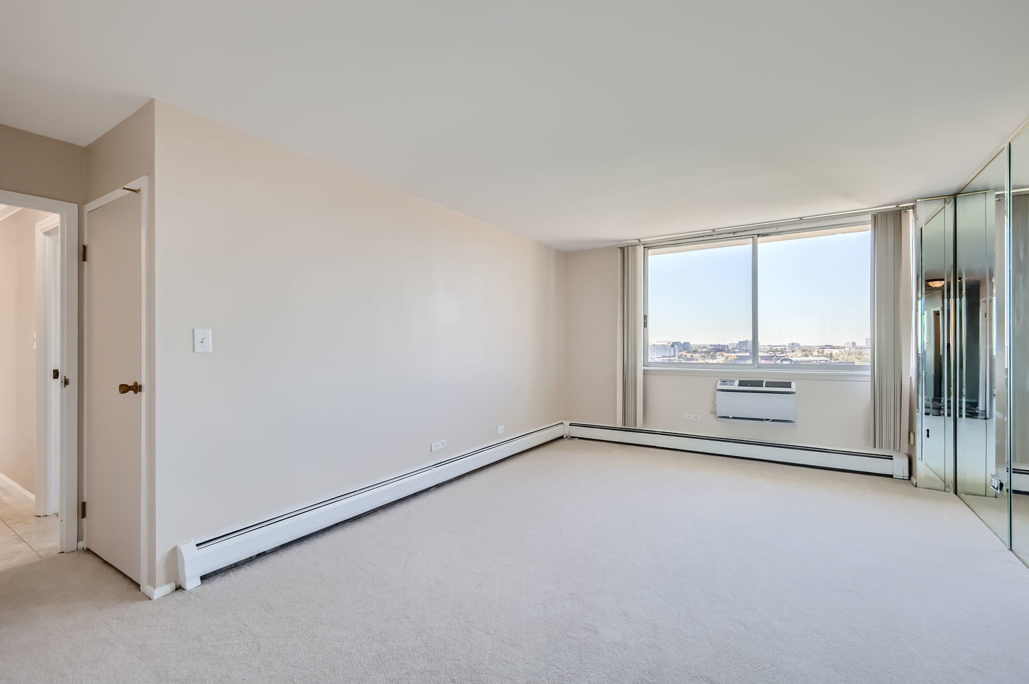 20 North Tower Road, Unit 12M Oak Brook, IL 60523 - Photo 16 of 28 an empty room with a empty space and windows