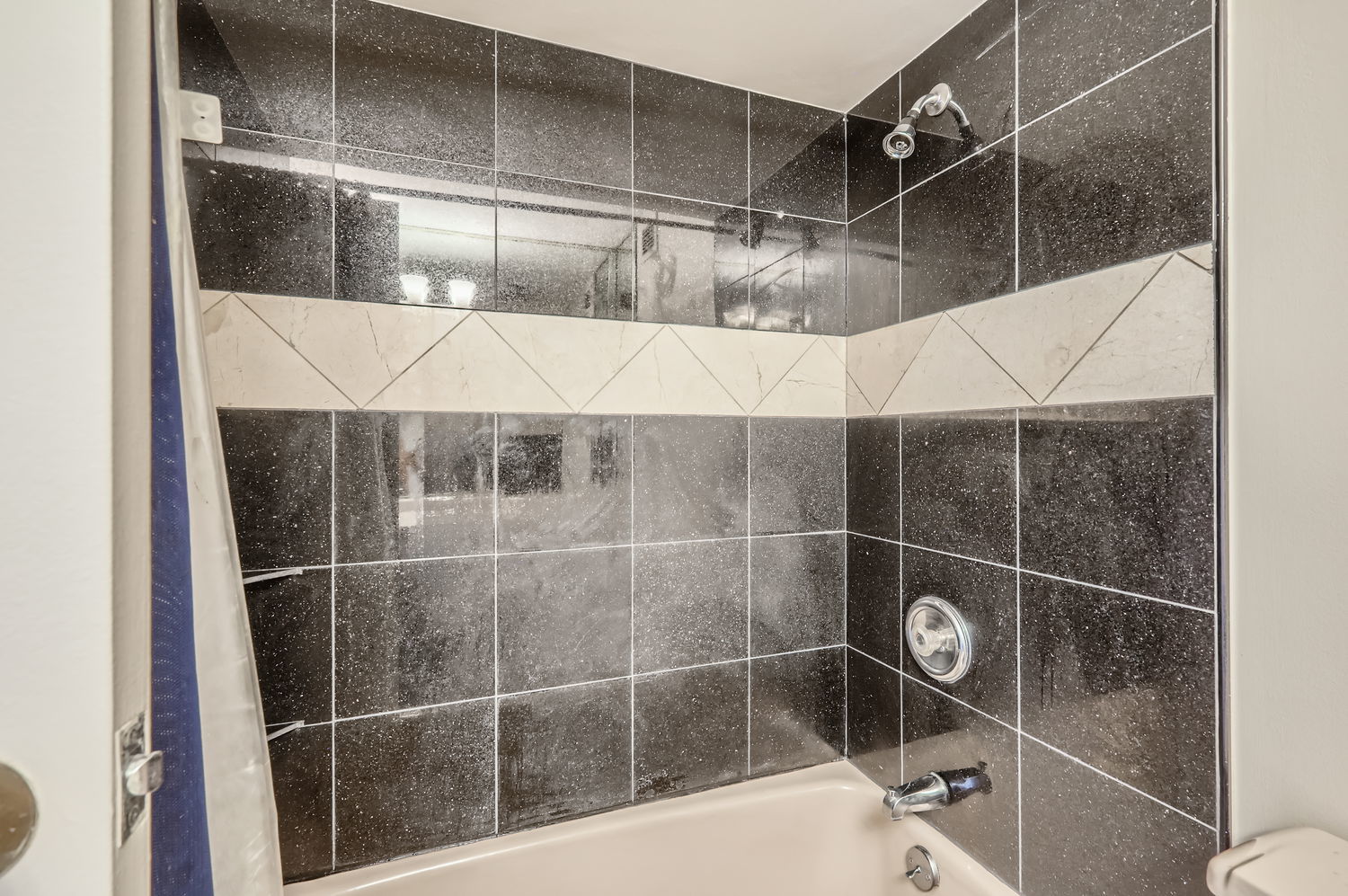20 North Tower Road, Unit 12M Oak Brook, IL 60523 - Photo 18 of 28 a bathroom with a shower and a sink