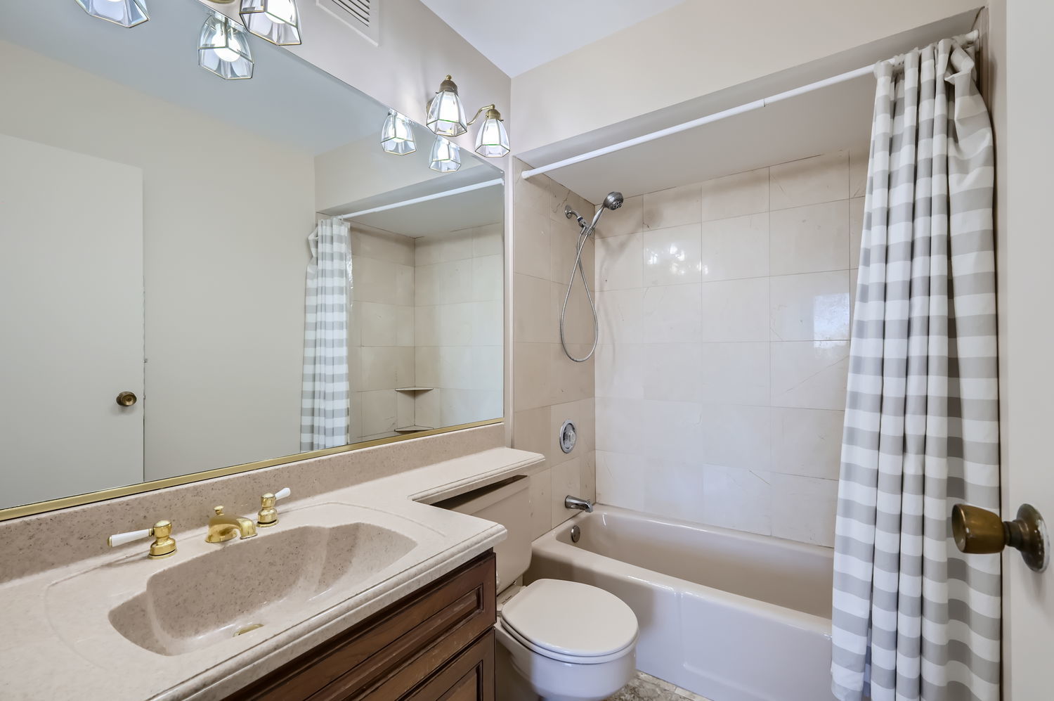 20 North Tower Road, Unit 12M Oak Brook, IL 60523 - Photo 21 of 28 a bathroom with a sink a toilet and shower