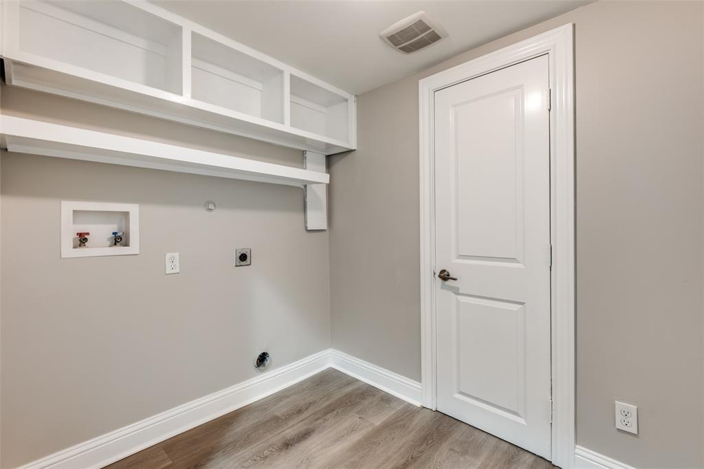 3912 Rawlins Street, Unit 2 Dallas, TX 75219 - Photo 15 of 25 a view of small space with racks on the wall