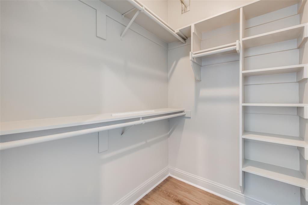 3912 Rawlins Street, Unit 2 Dallas, TX 75219 - Photo 20 of 25 a view of an empty walk in closet