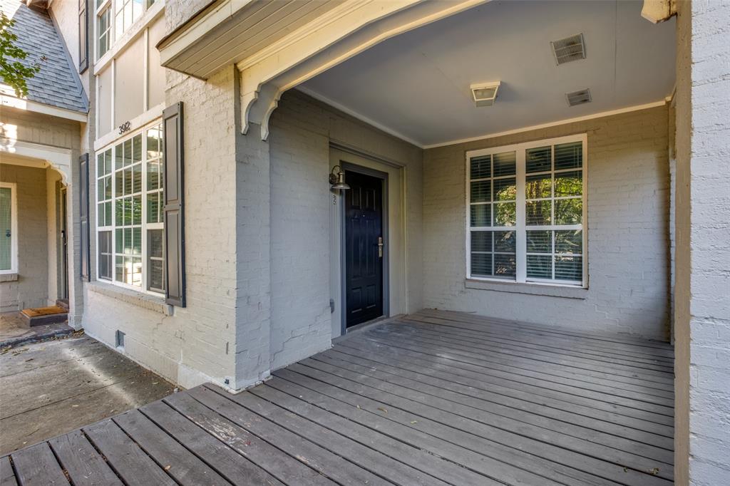 3912 Rawlins Street, Unit 2 Dallas, TX 75219 - Photo 25 of 25 a view of a house with a glass door