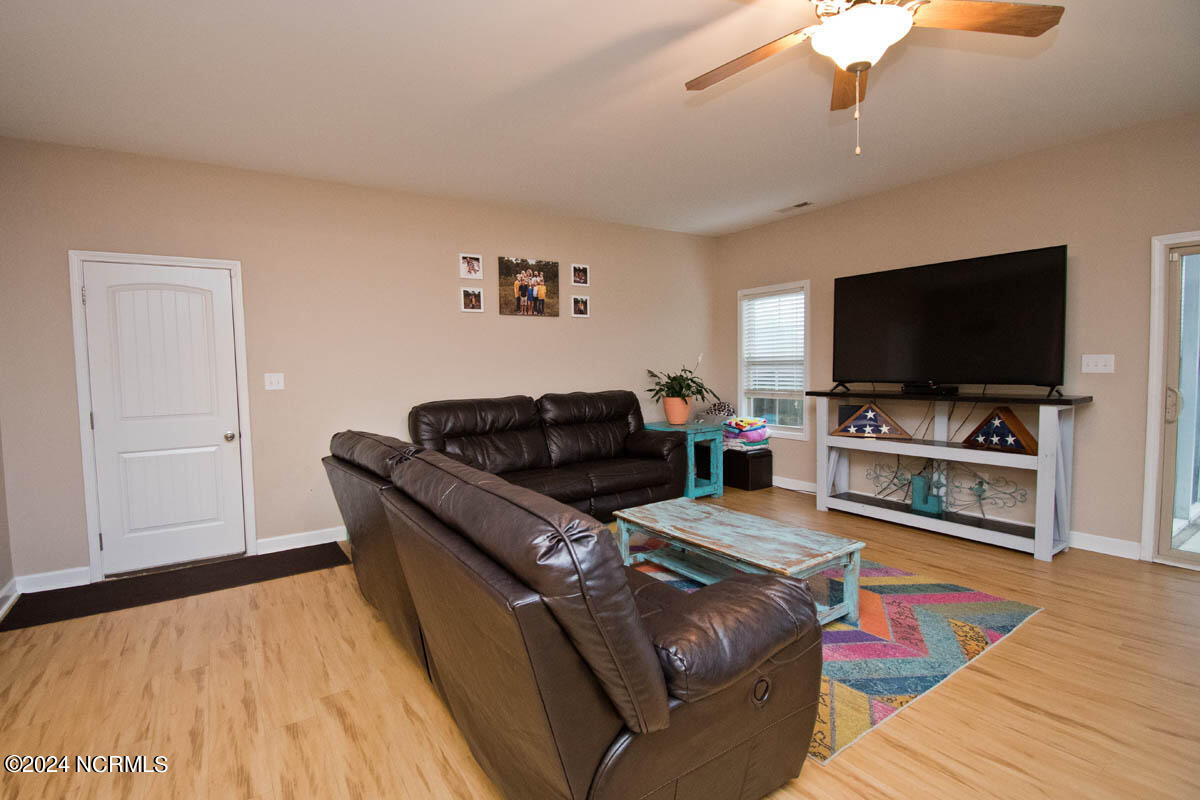 397 Inverness Drive Hubert, NC 28539 - Photo 18 of 50 Great room to garage